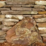Custom Rustic Stone Wall Designed by Landscape Architecture, Inc.